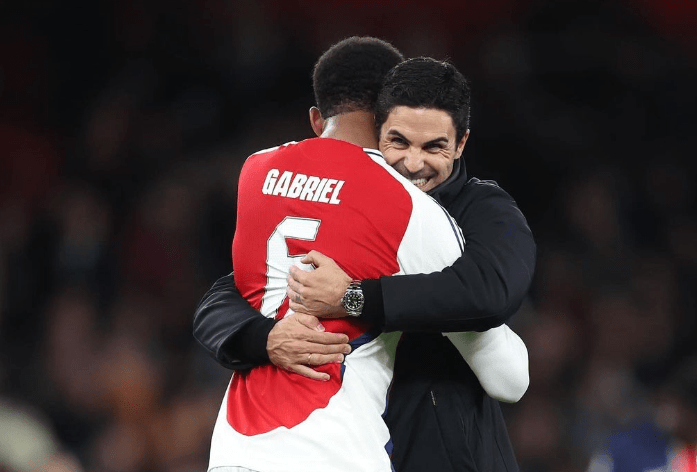 Mikel Arteta celebrates with Gabriel.